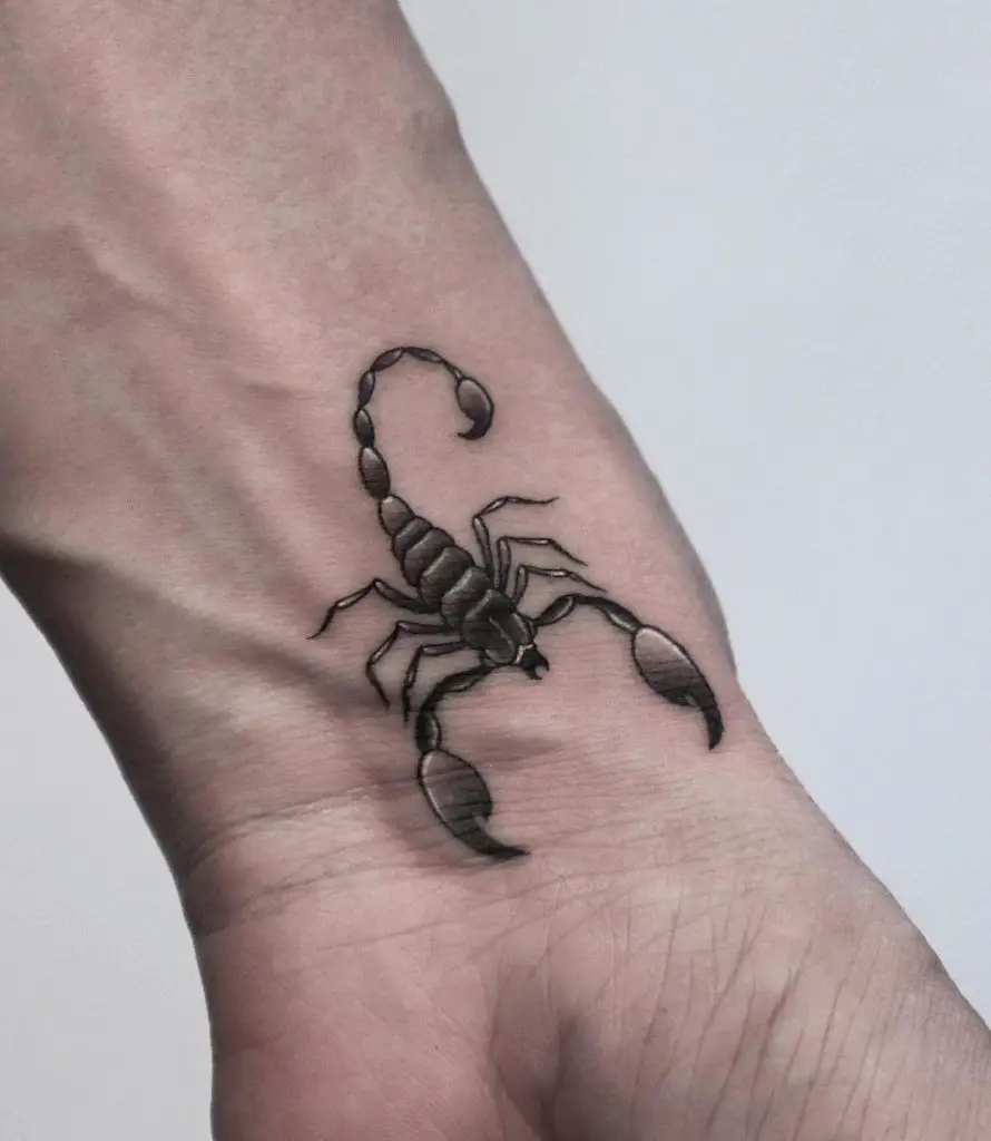 scorpion wrist tattoo