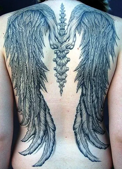 Full-back angel wing tattoo