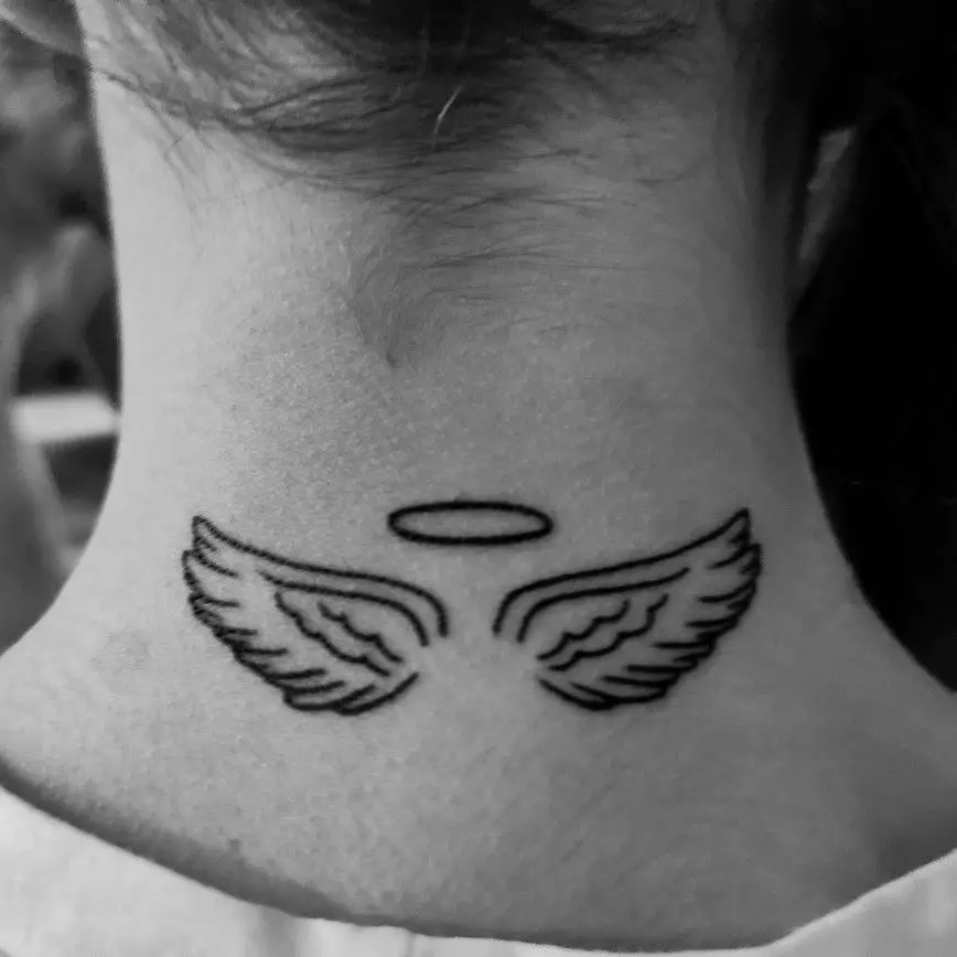 Beautiful angel wing tattoo on neck