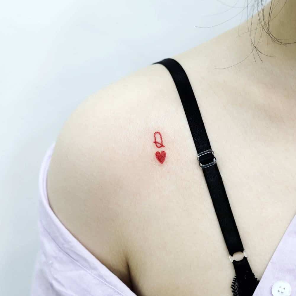 queen of hearts tattoo wrist