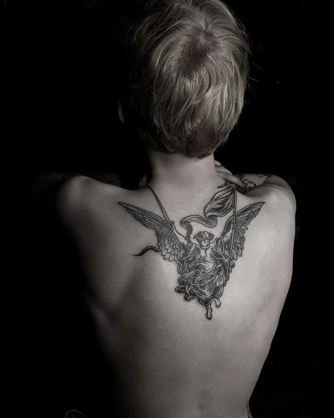 Angel wing tattoo design on the back
