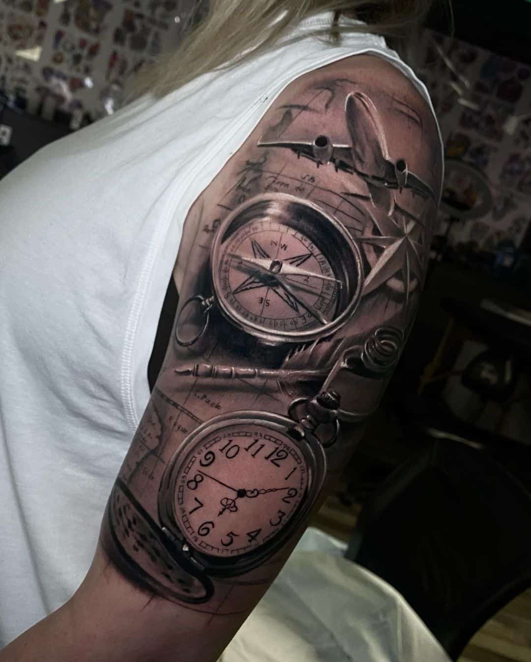 clock and compass tattoo on arm