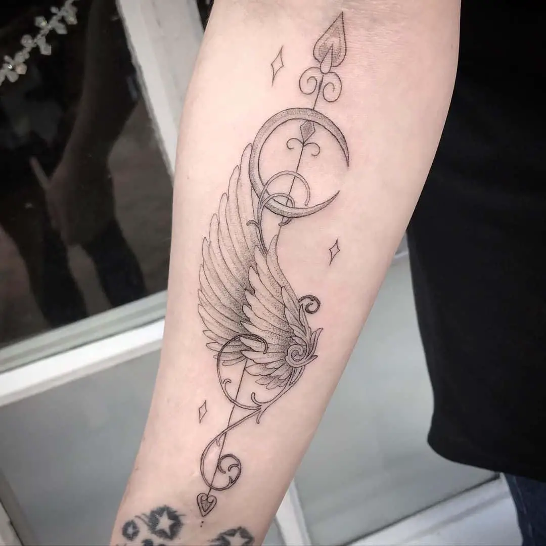Angel wing forearm tattoo
