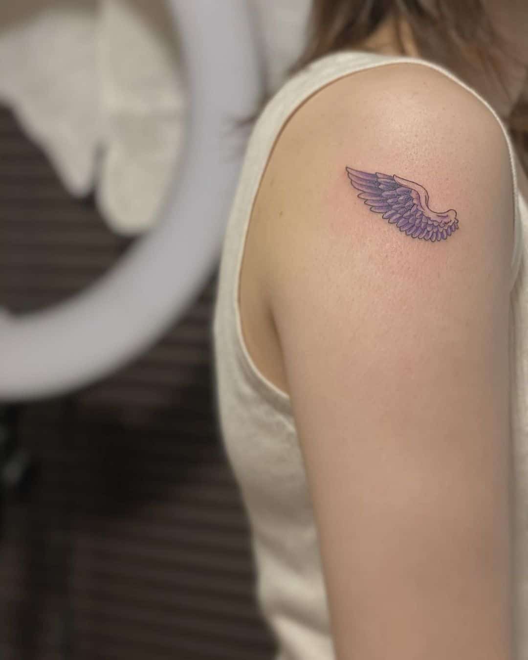 Small angel wing tattoos for females