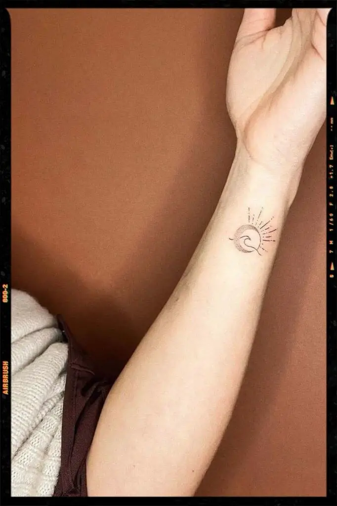 Sun tattoo idea for the wrist with wave