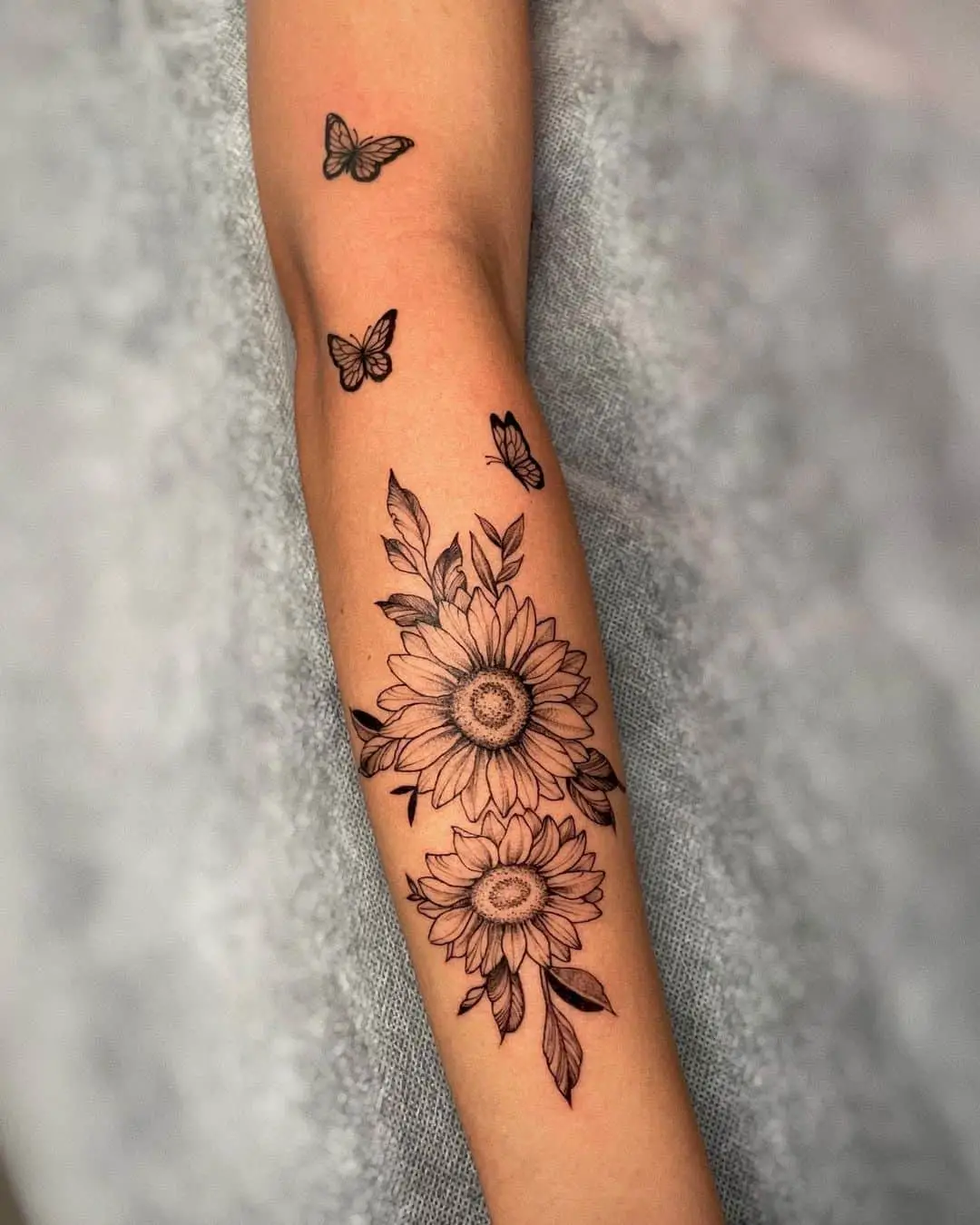 Black and grey Sunflower with Butterfly Tattoo