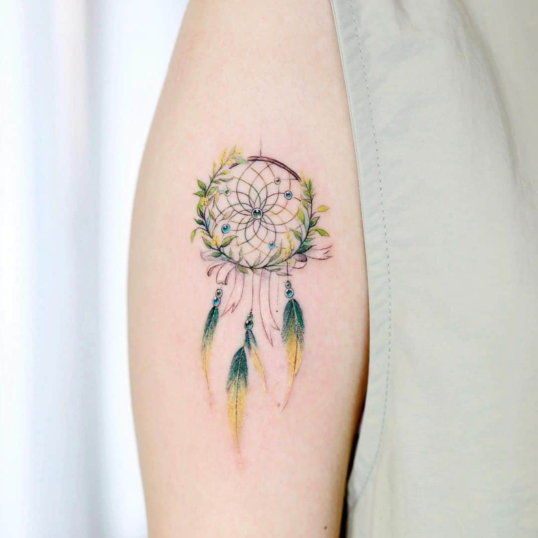 Colored Dream Catcher Tattoo with leaf