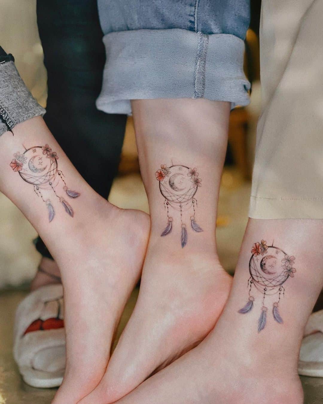 dream catcher foot tattoos