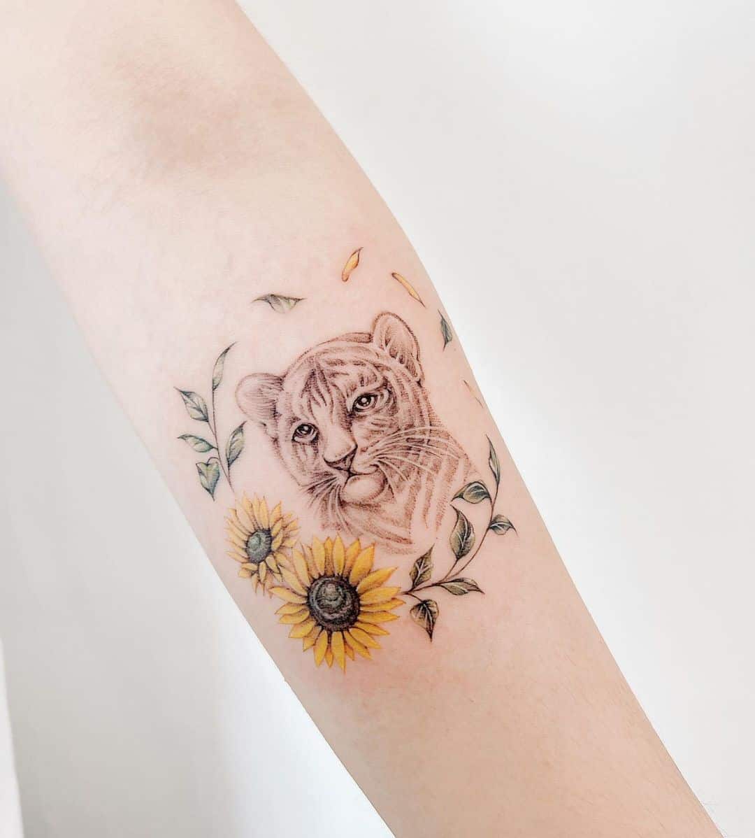Delicate sunflower tattoos with tiger
