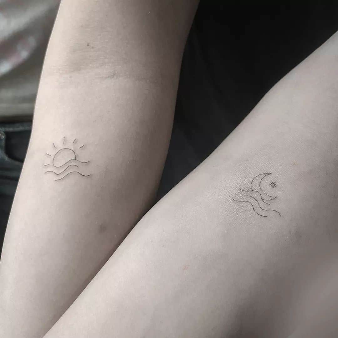 wave and sun tattoo
