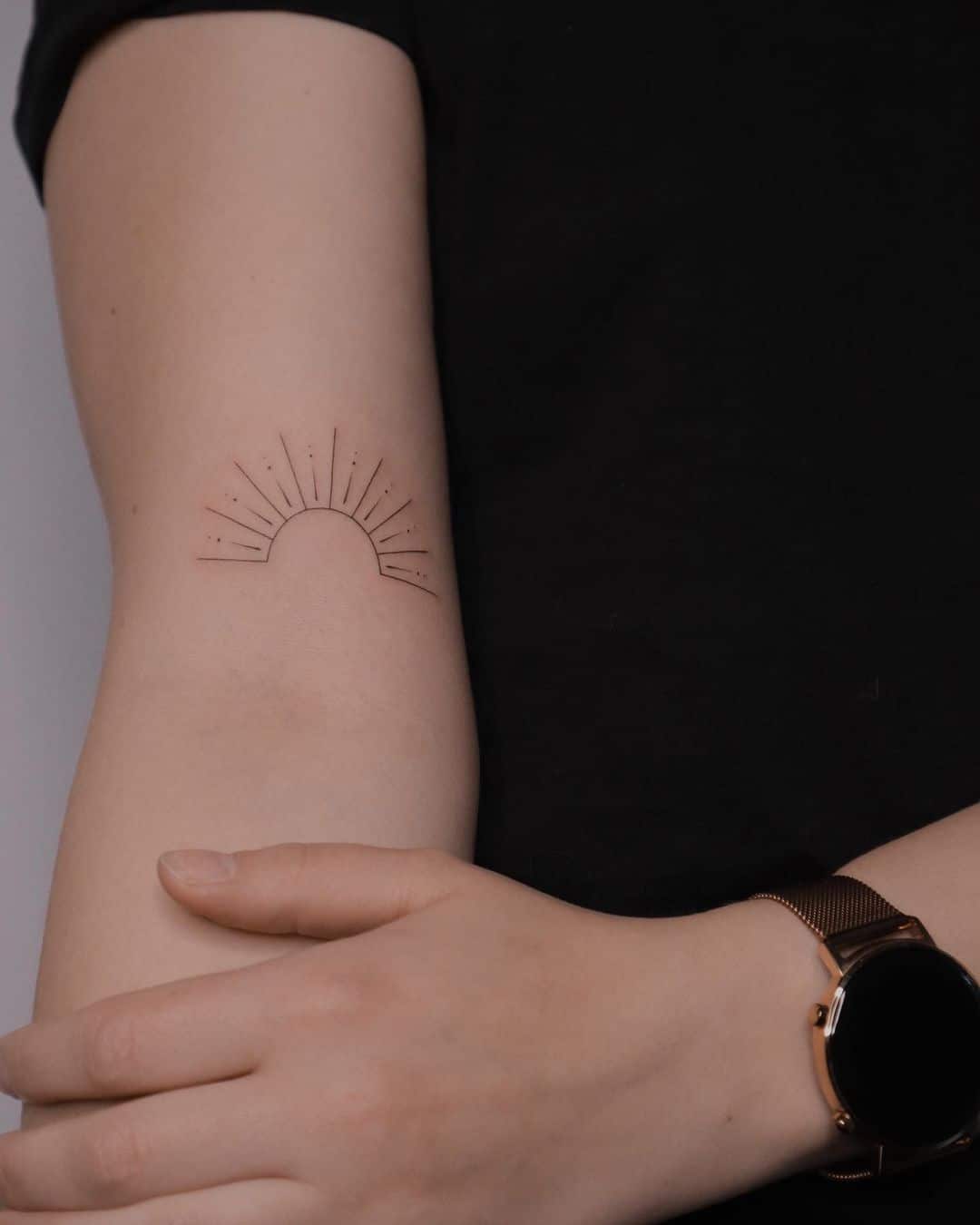 Half sun design tattoo 