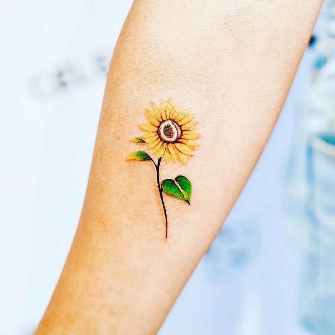 Sunflower tattoo on forearm