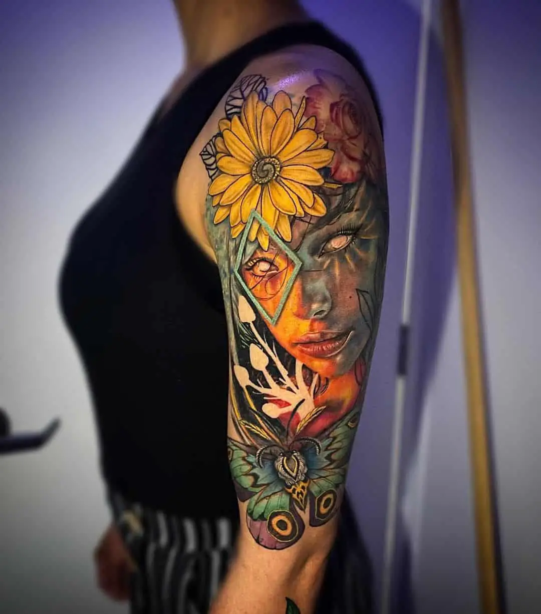Blooming sunflower tattoo with girl portrait tattoo