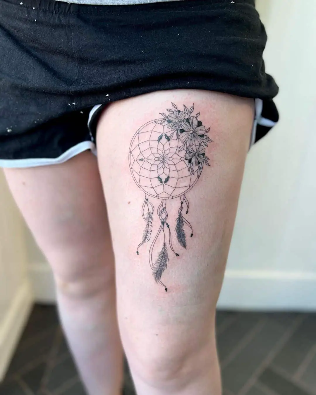 Dream Catcher Tattoo On Thigh with flower