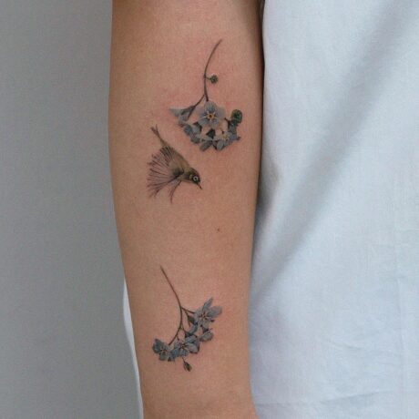 Beautiful bird tattoo by comotattoo