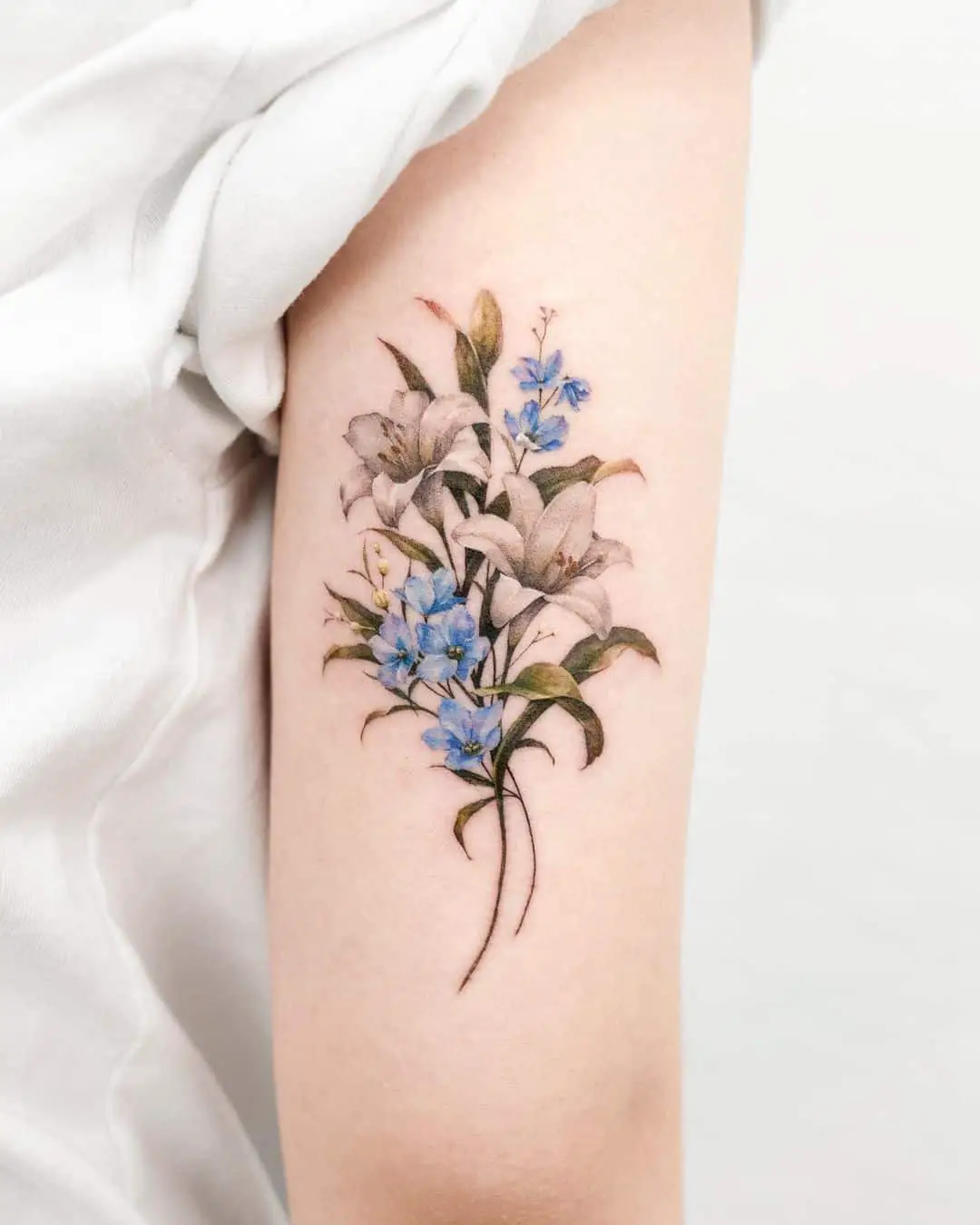 Beautiful colored flower tattoo by donghwa tattoo