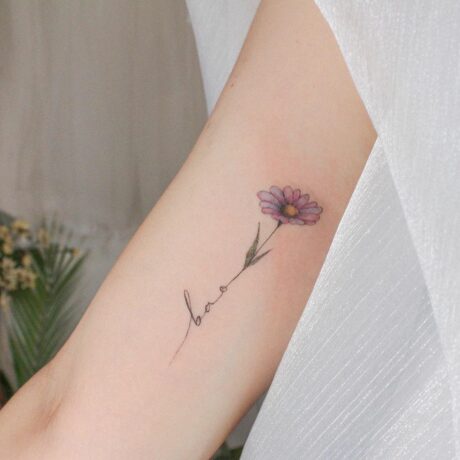 Beautiful dasiy tattoo on arm by riskiesonjia