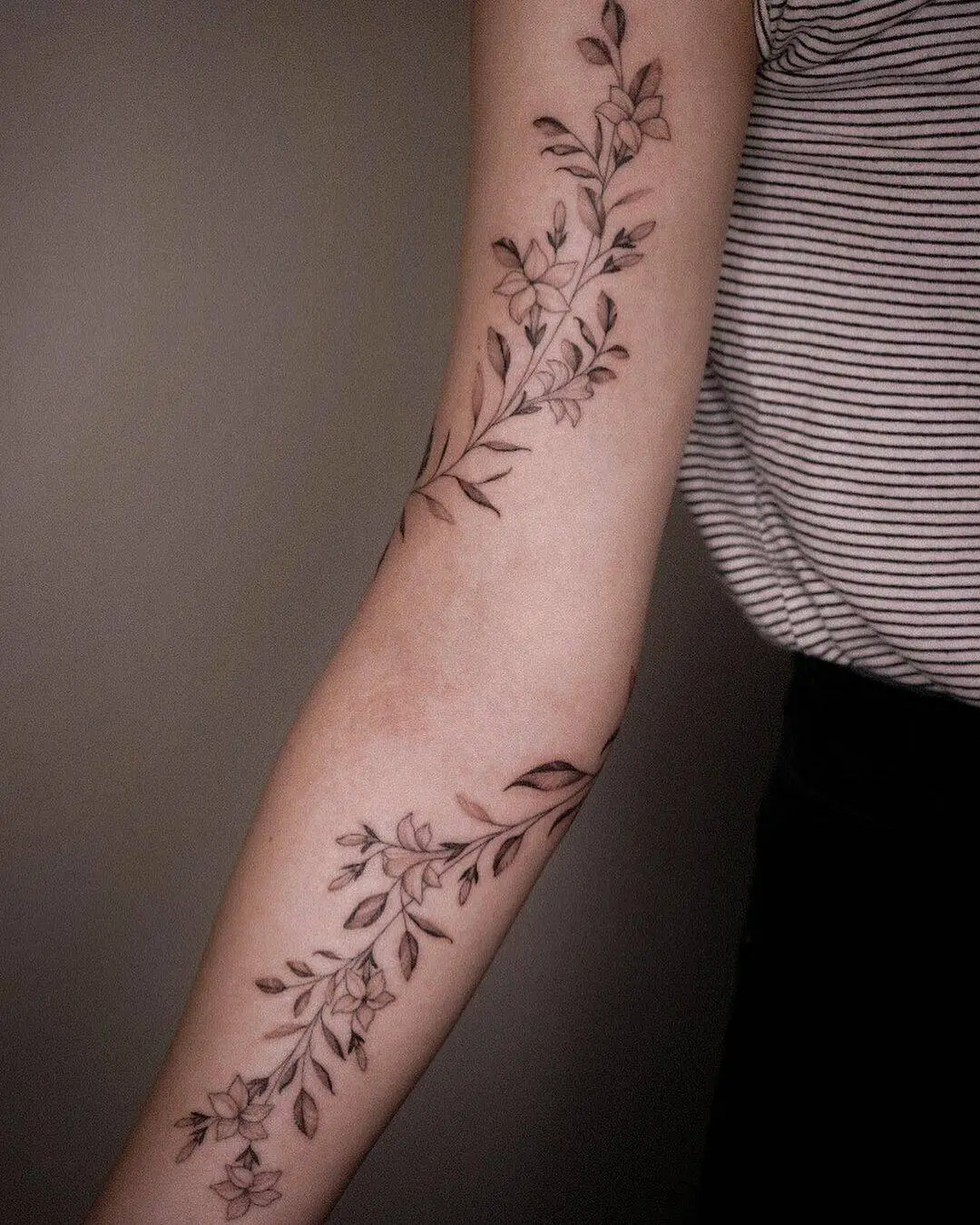 Black ink jasmine tattoo by tory tattooer