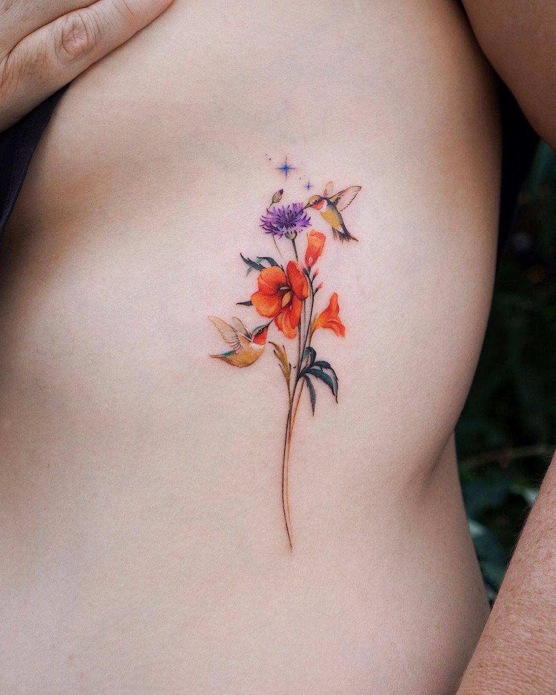 Colorful flower tattoo by abii tattoo
