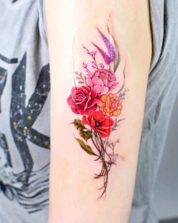 Colorful rose tattoo on arm by yerae tt 1