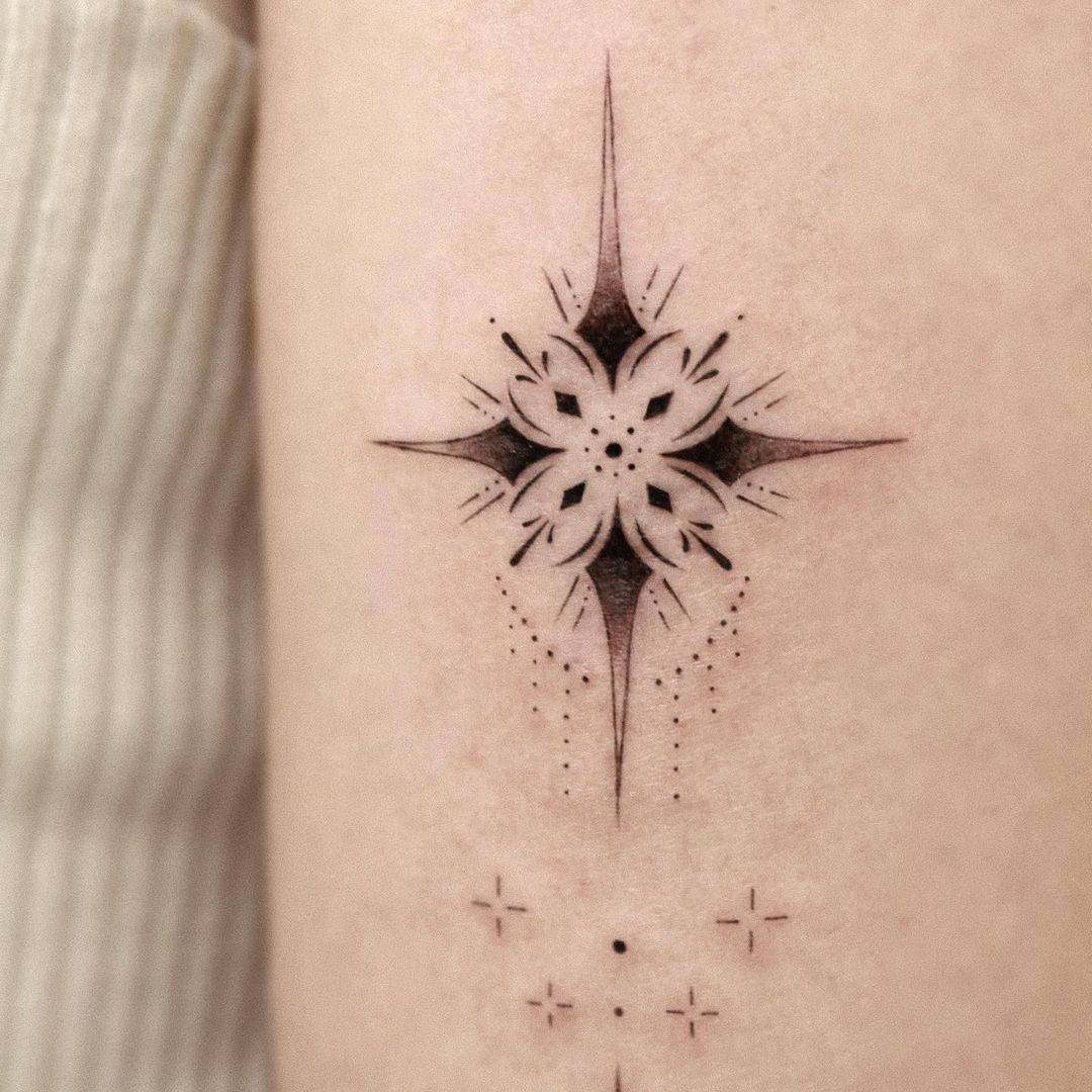 Cute Ornamental star tattoo by kokomo.tattoo