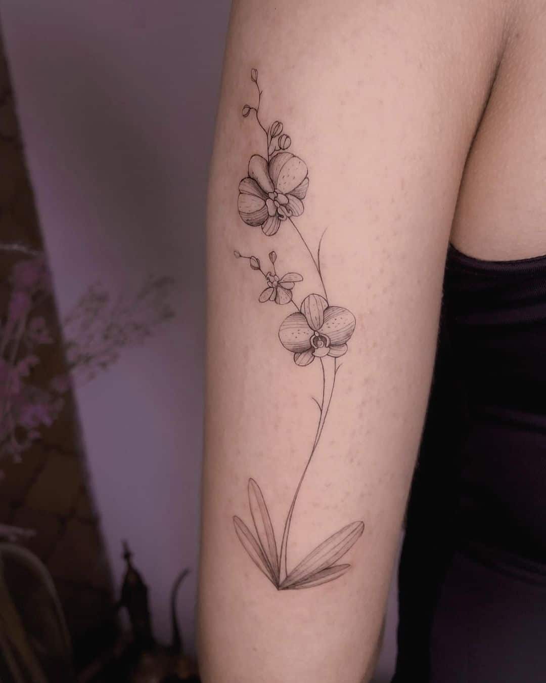 Fine line Orchid tattoo by lauvaan