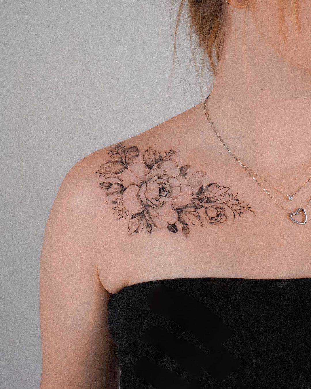 Fine line rose tattoo by