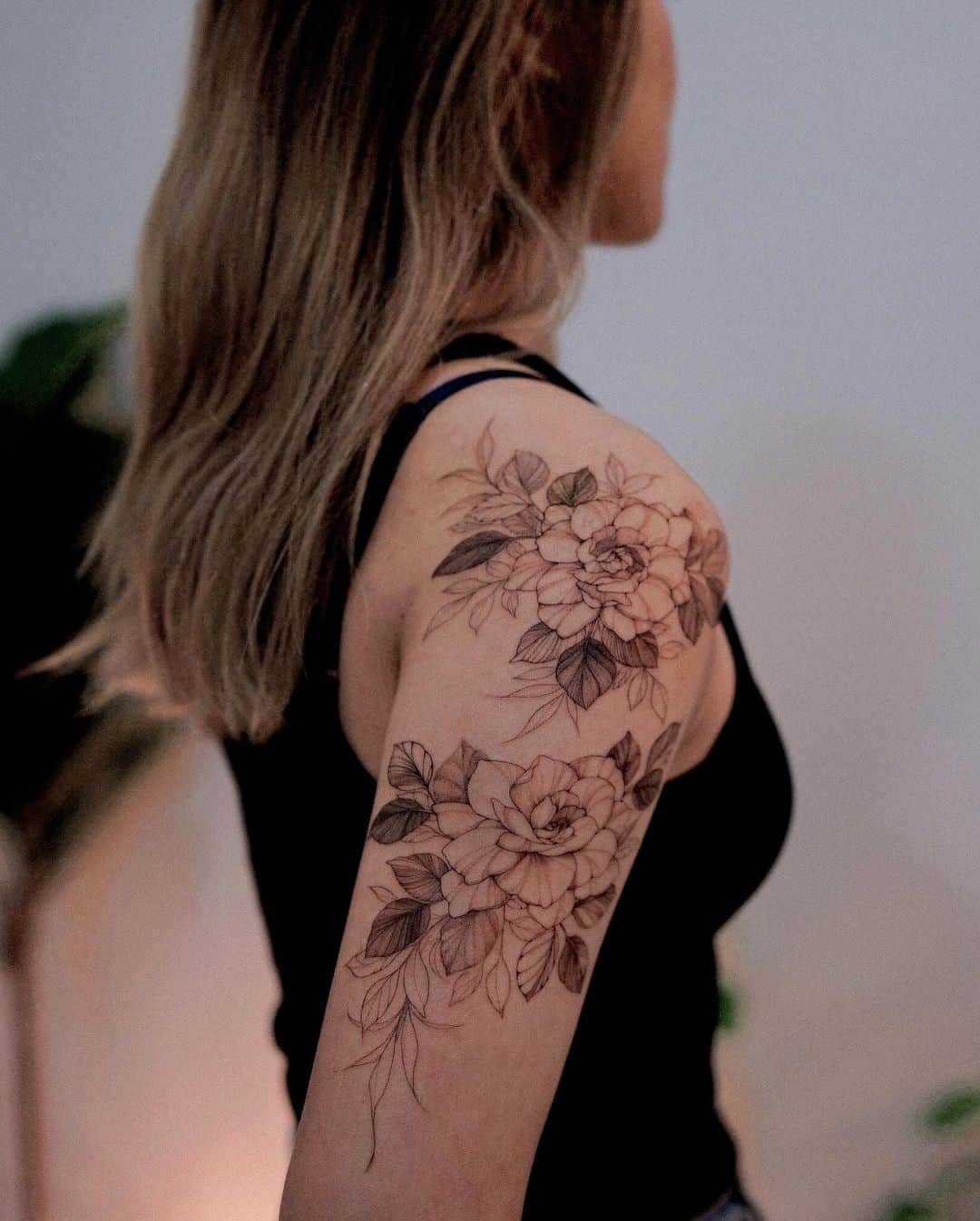 Fineline flower tattoo by goyotattooart