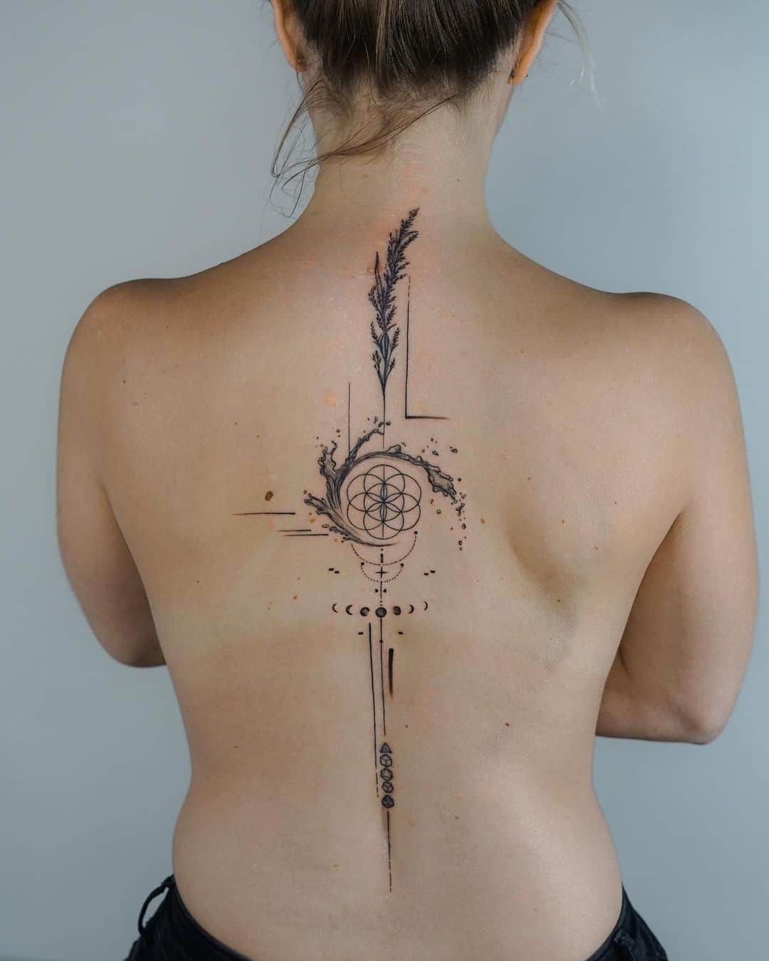 Flower of tattoo on back by dd verba