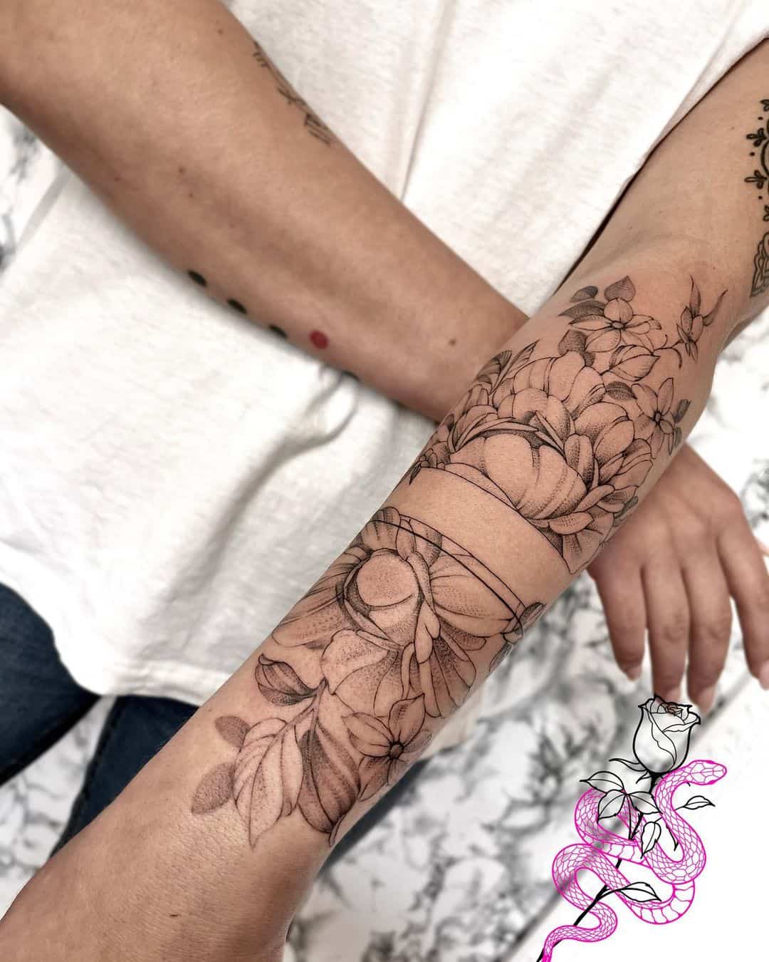 Flower tattoo on arm by unique.art tattoo