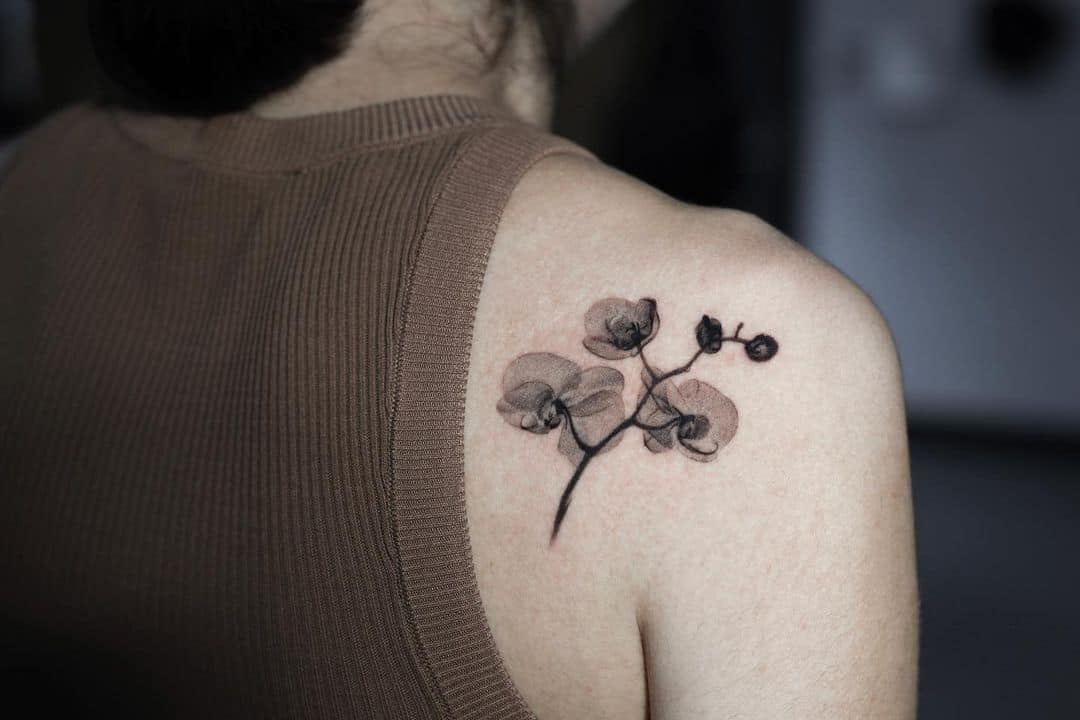 Orchid flower tattoo by e.bin ink