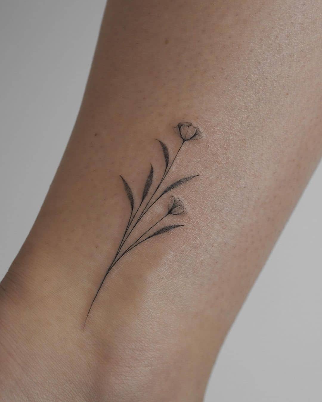 Realistic flower tattoo by violka tattoo