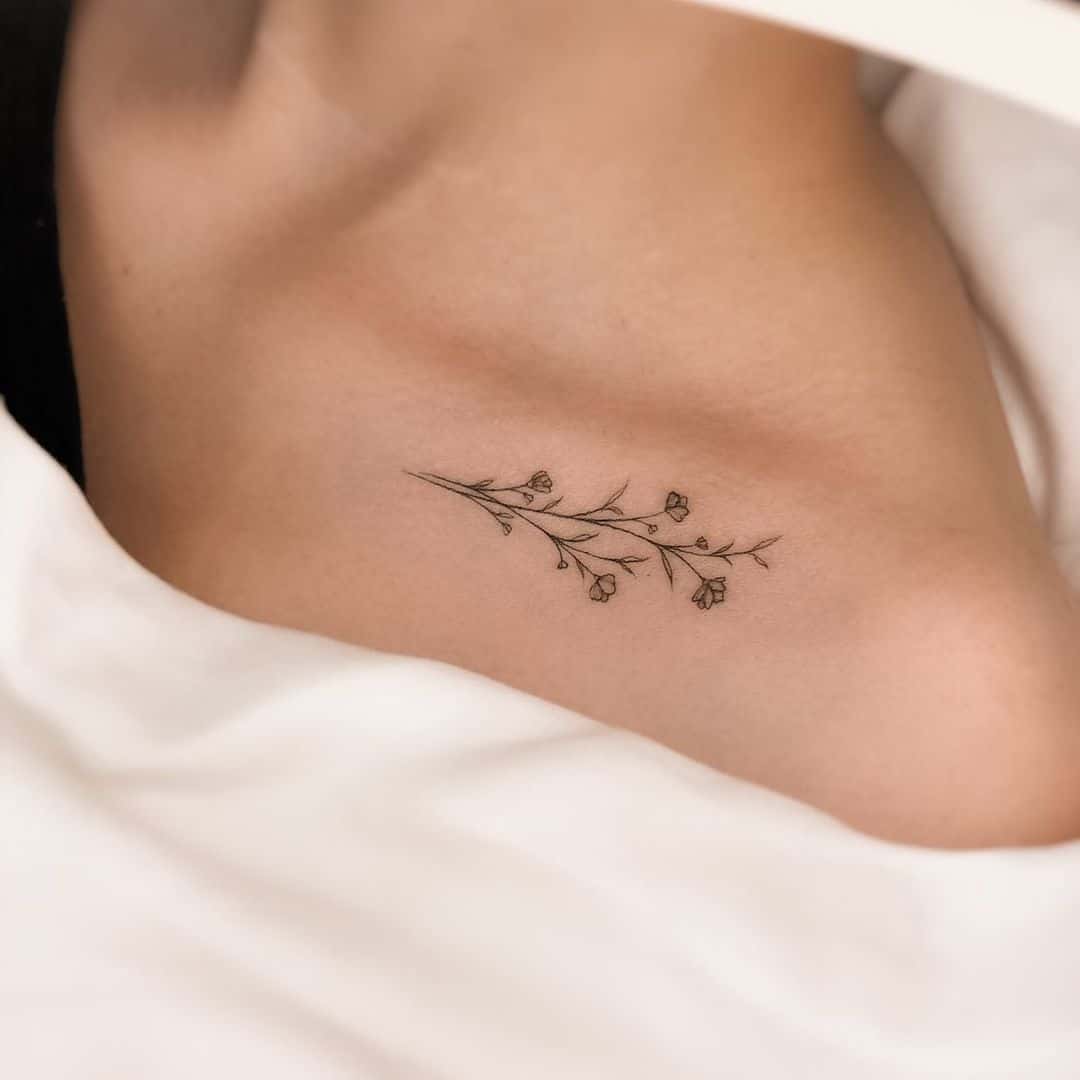 Simple flower tattoo by inkoma.tattoo