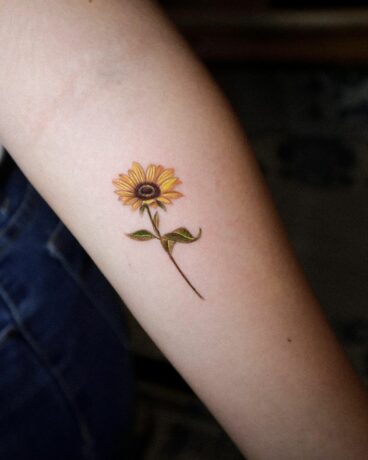 Simple sunflower tattoo by naashofficial