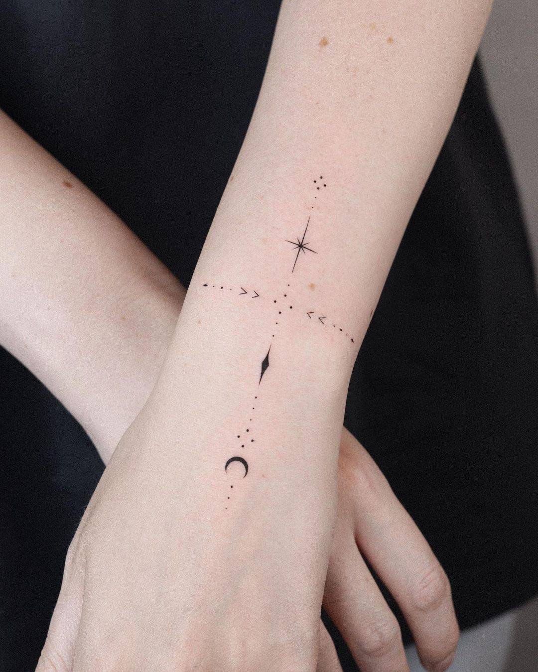 Star tattoo with geometric pattern by orma tattoo