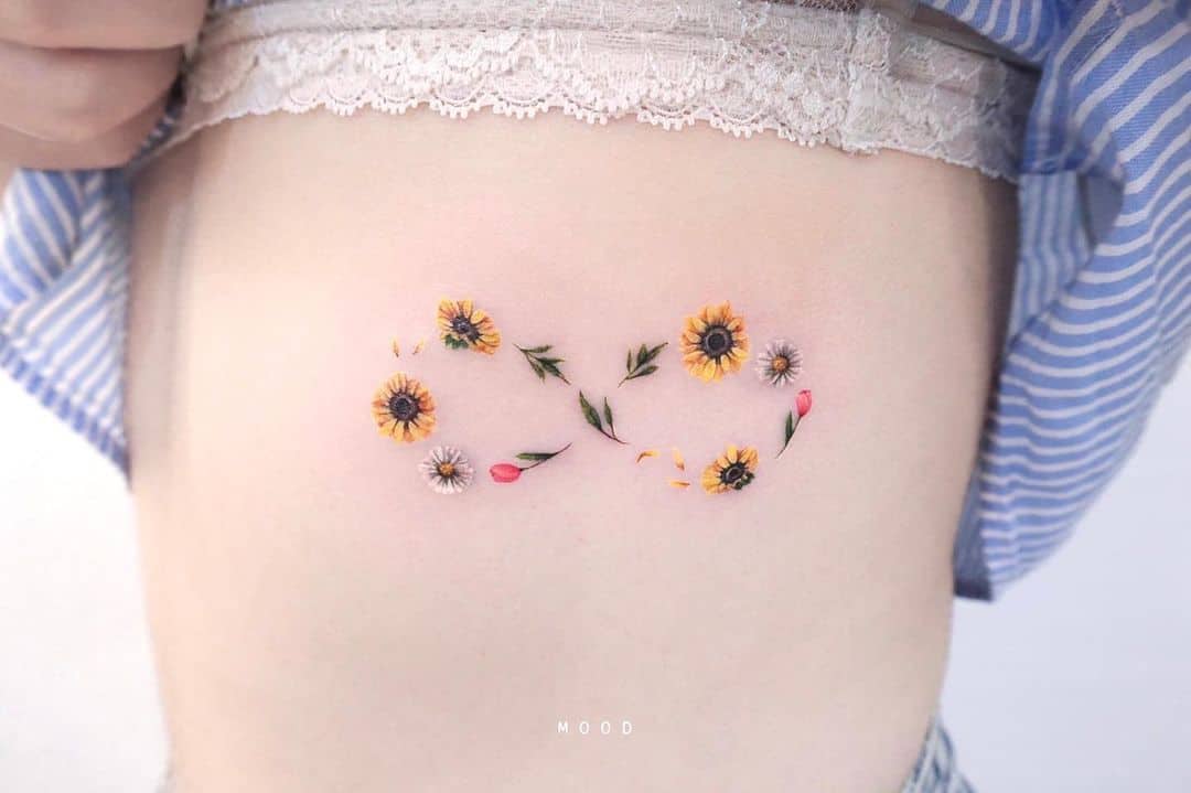 Sunflower tattoo with infinity sign by mood bkk