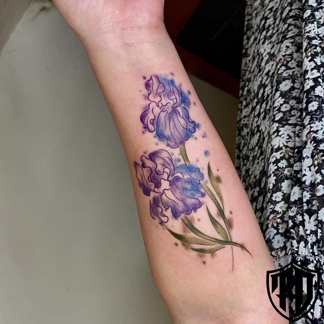 Watercolor iris tattoo by sarina.tattoo