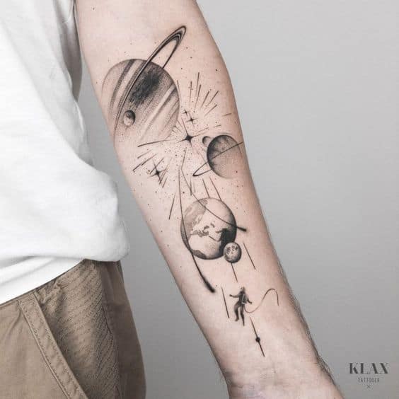 Wonderful shooting star tattoo with different planet in arm sleeve
