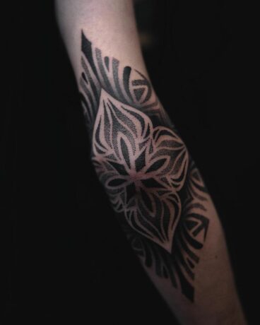 Amazing Geometric mandala tattoo on arm by liris.ink