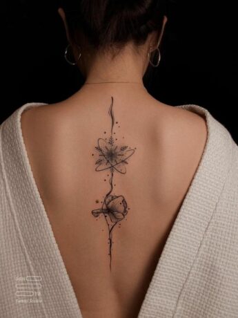Amazing geometric tattoo on back 1