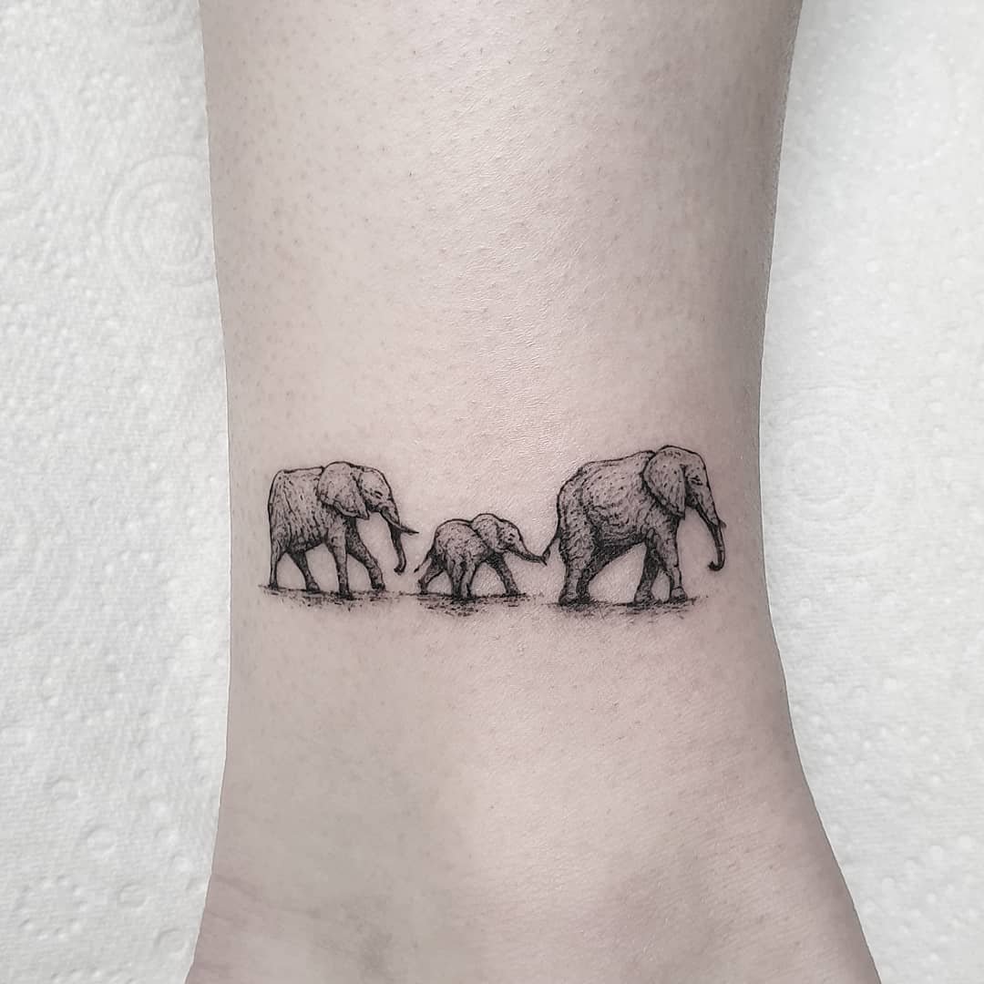 Family elephant tattoo by leehumphs tattooer