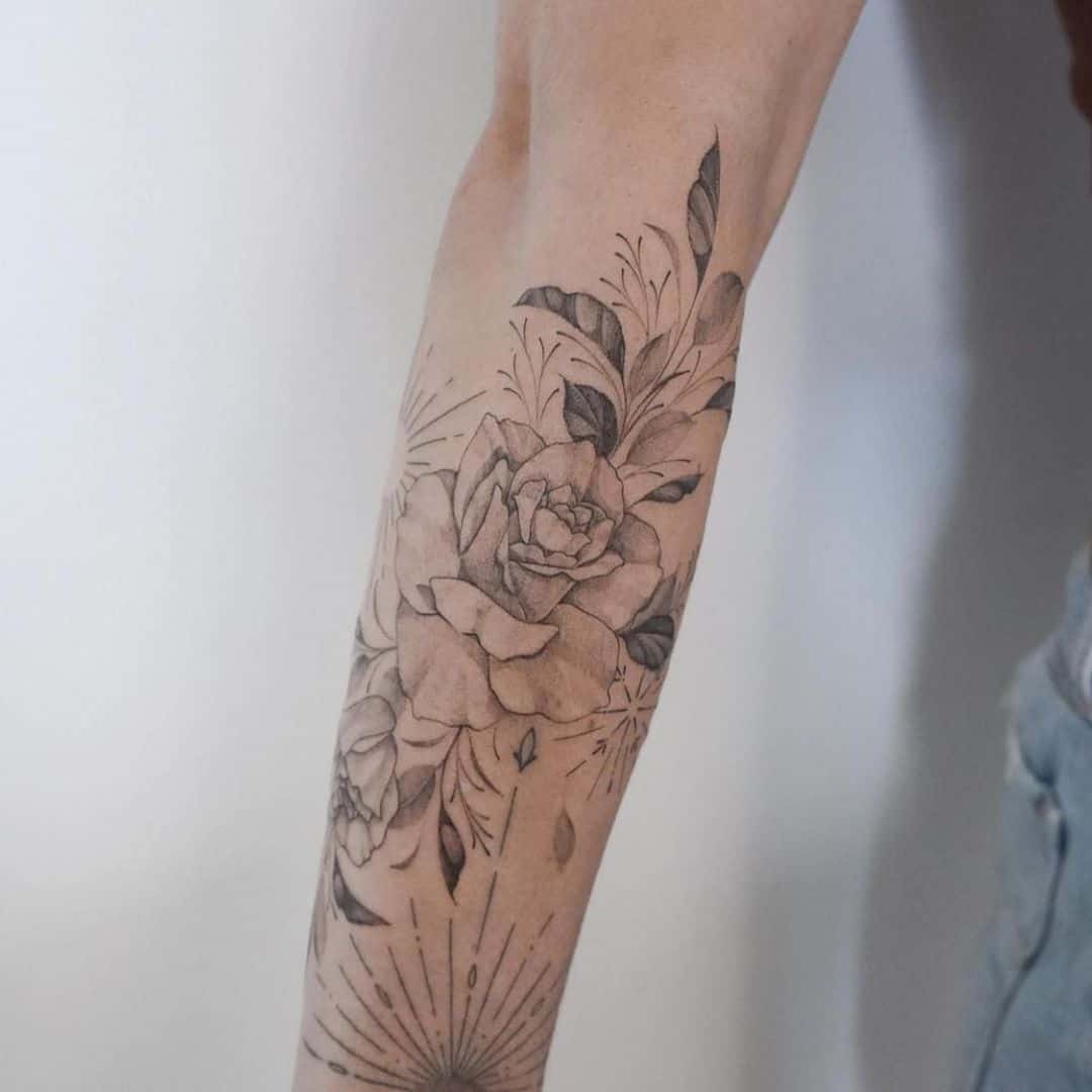 Fine line flower tattoo by crownandfeathertattoo