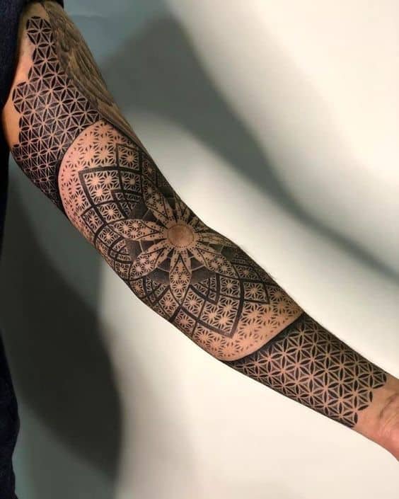 Geometrci flower tattoo on full arm