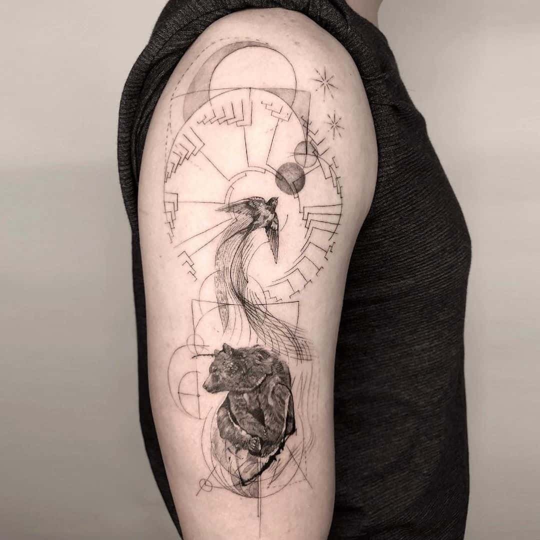 Geometric bear tattoo on arm by monikamoni.art 1