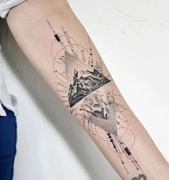Geometric mountain tattoo design