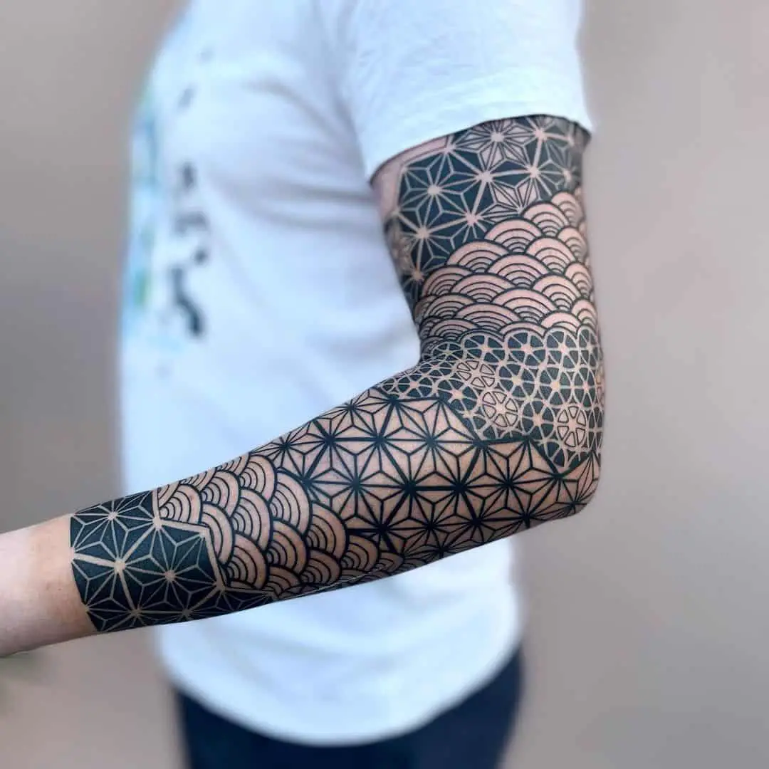 Geometric tattoo on arm by jakabtattoo