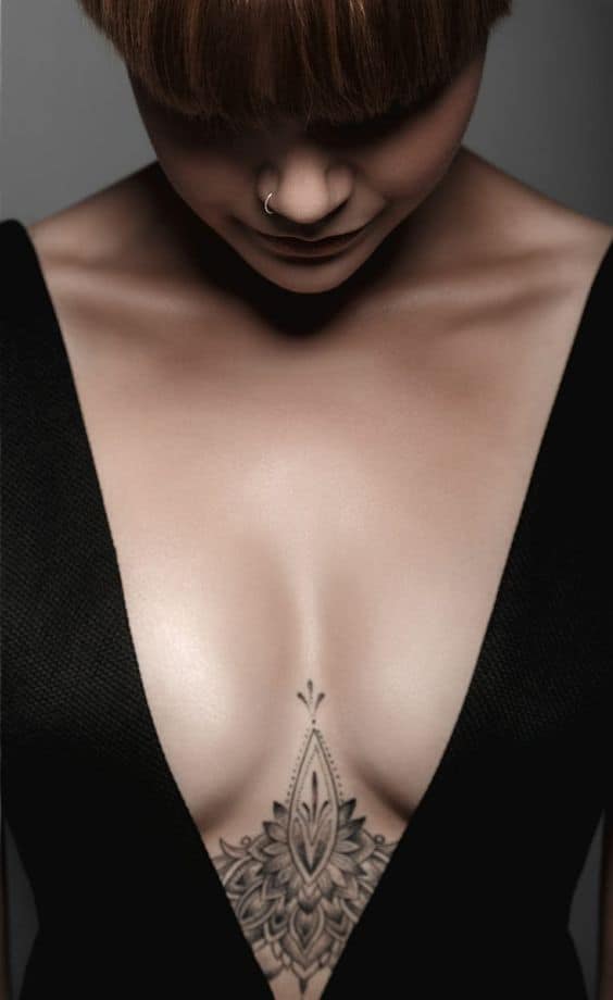 Under boob geometric tattoo