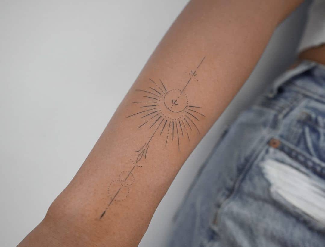 Unique geometric sun tattoo by lilyblu.ink