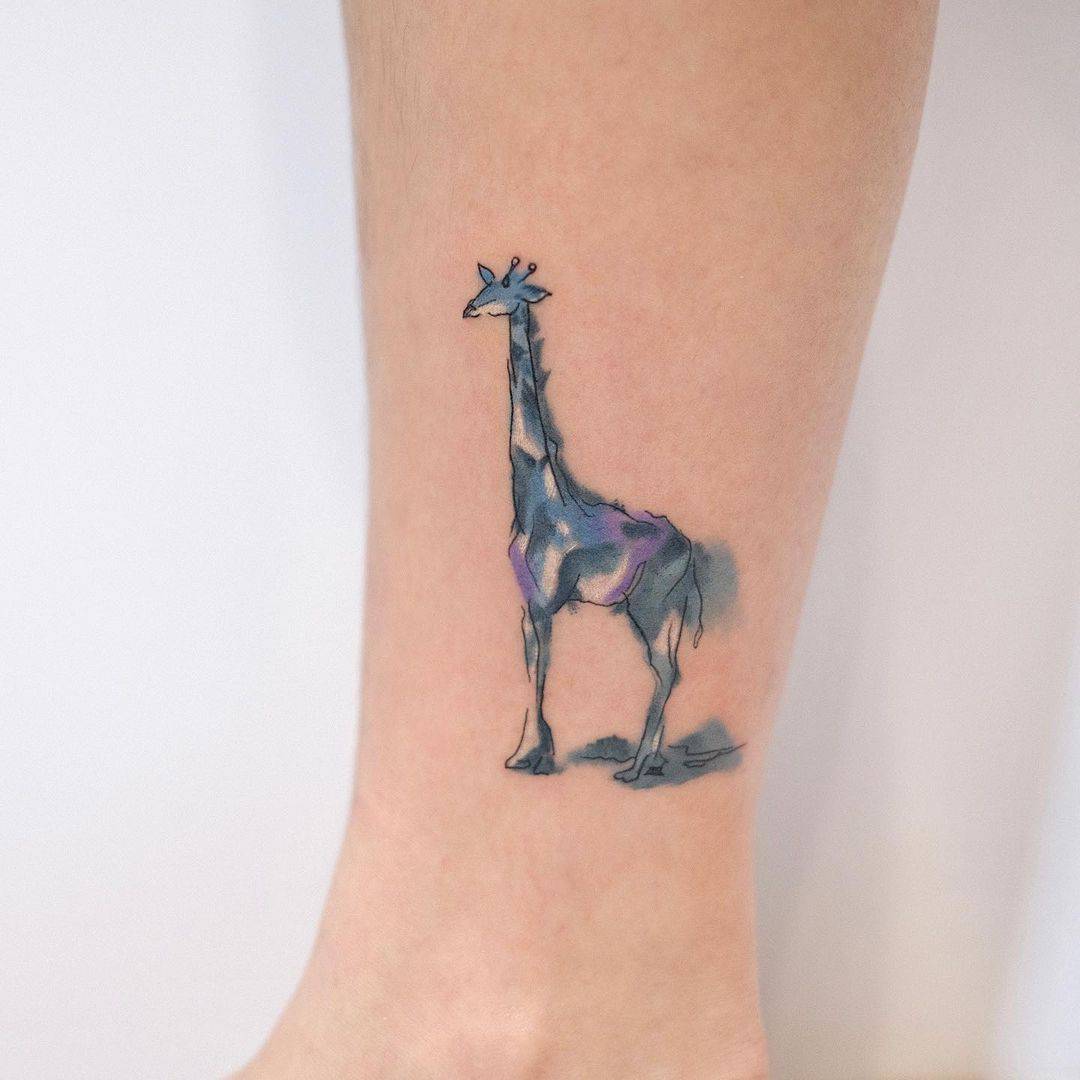 Vibrant Trash Polka Giraffe Calf Tattoo