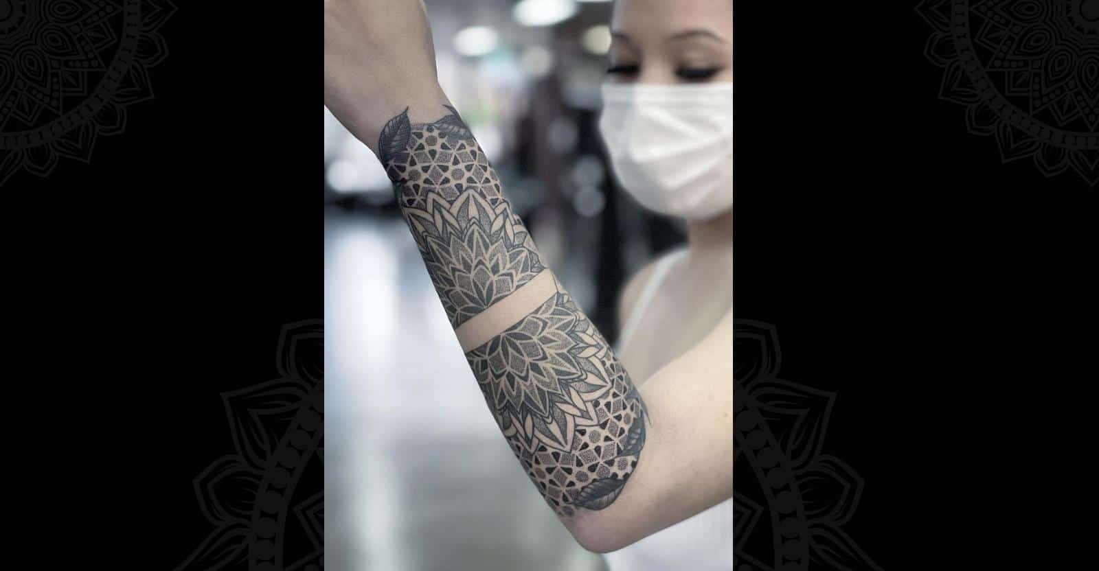 geometric tattoo on women forearm